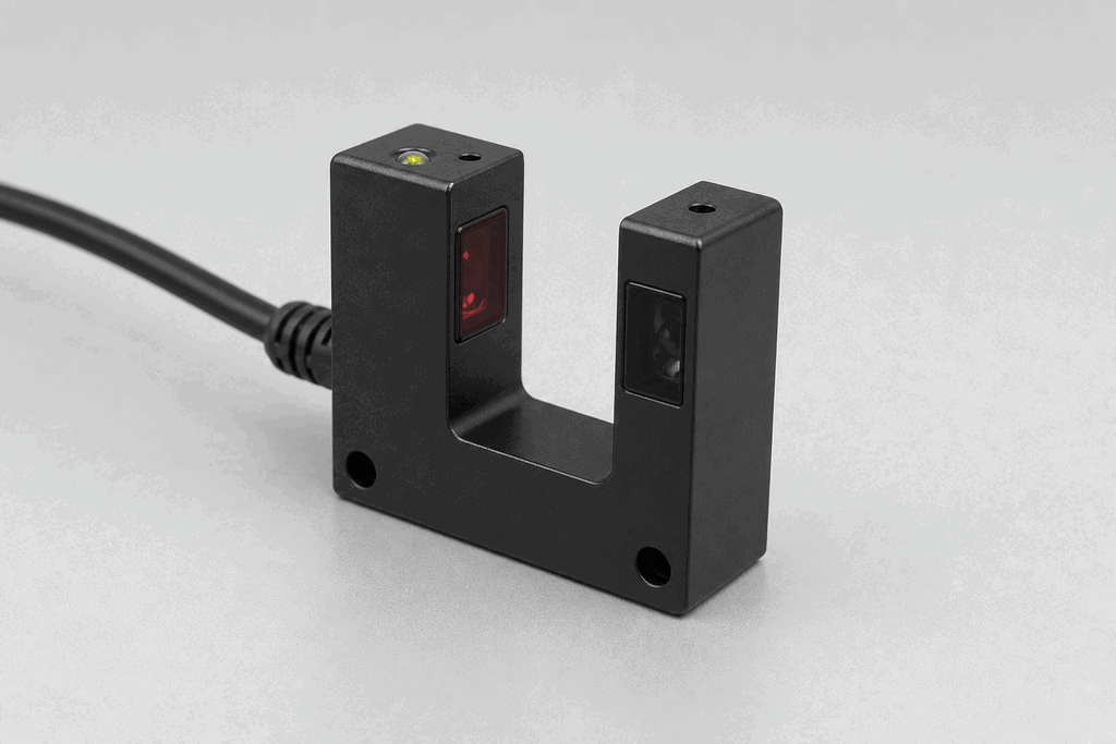 Representative real-world Photo-Fork Sensor (Slot Sensor) hardware on an industrial workbench